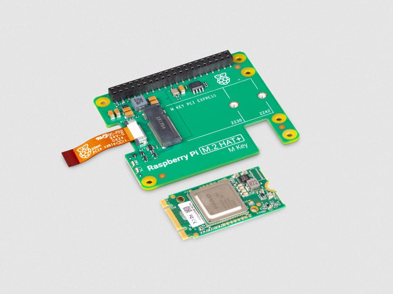 Disassembling the Raspberry Pi AI kit shows the constituent parts, including the Hailo processor.